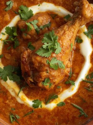 MURG MASALA (FULL) in dish with leg piece (1) MURG MUSSALAM (FULL)
